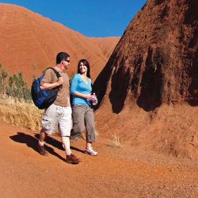 Walkers at Uluru. Photo: Tourism Australia