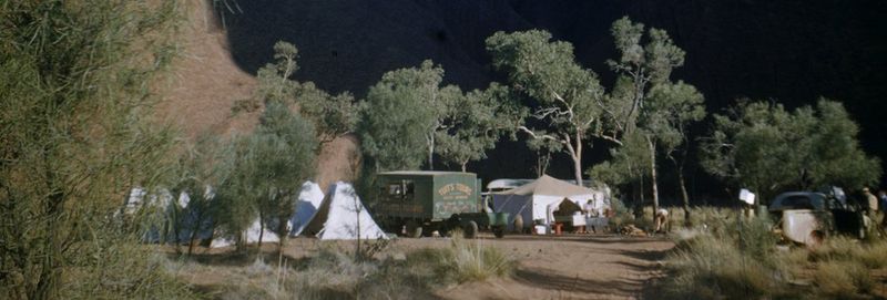 Tents set up at the base of Uluru.